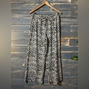 Great condition! Calvin Klein Black and White Animal Print Wide Leg Pants